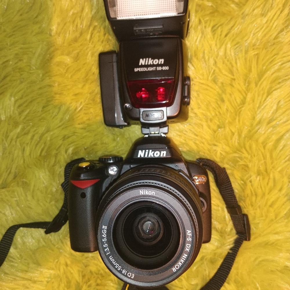 Nikon D40X SLR Digital Camera with Lens, Speedlight, SD card, Strap and Bag